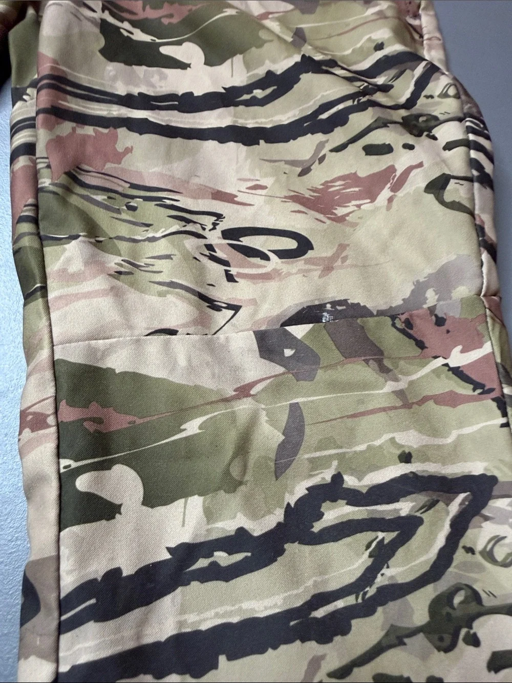 Kid’s Under Armour Storm Camo pants. Size: 10